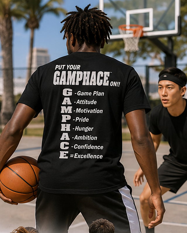 Man on a basketball court in a black Gamphace tee with the back print